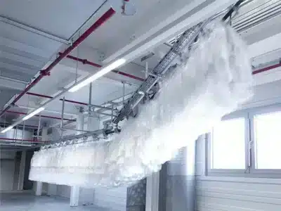 Overhead conveyor technology for the textile industry even over several room levels